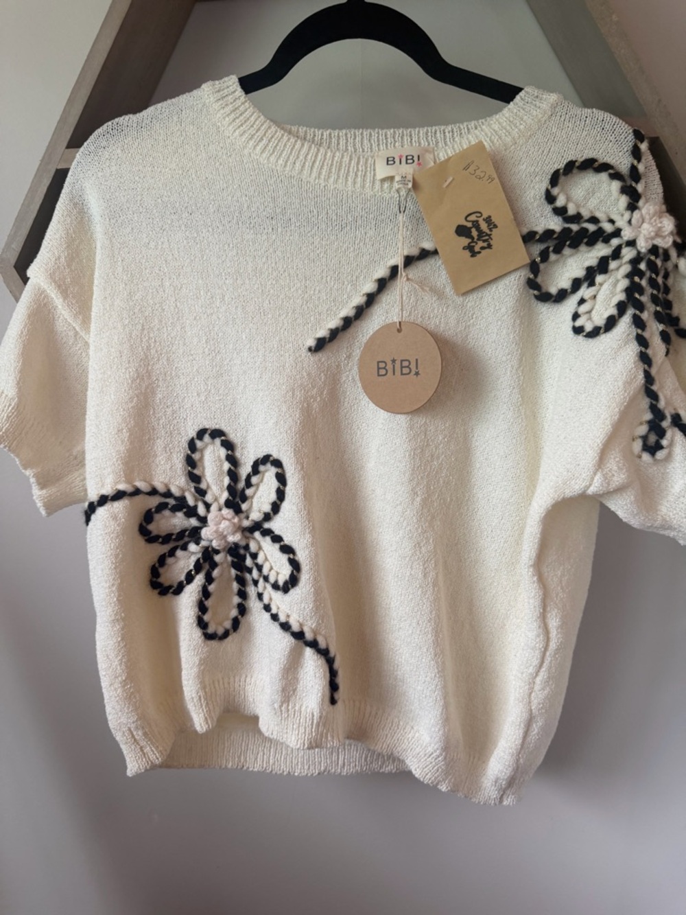 BiBi Cream Short-Sleeve Knit Sweater with Black Braided Floral Appliqués